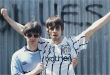 Photo of ¿Oasis cervecero? La increíble foto de la banda inglesa con un hincha de Quilmes en su primera visita al país